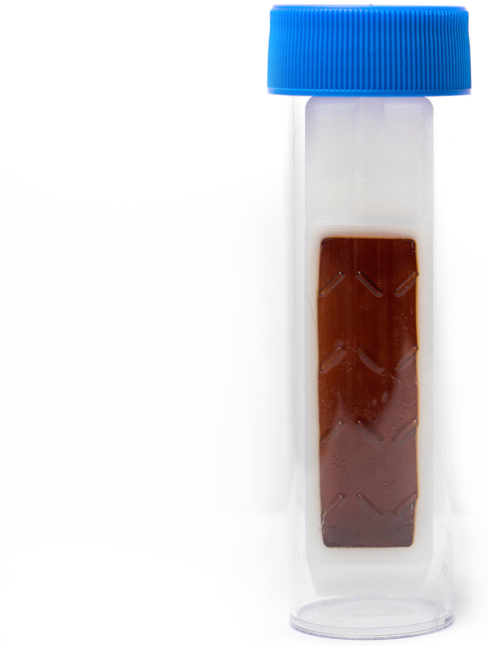 A dipslide culture method for monitoring microbial contaminations in industrial fluids and fuels on a white background.